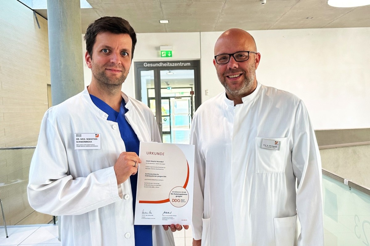 Freuen sich über eine wichtige Auszeichnung: Dr. Sebastian Schwerbrock und Prof. Dr. Dirk