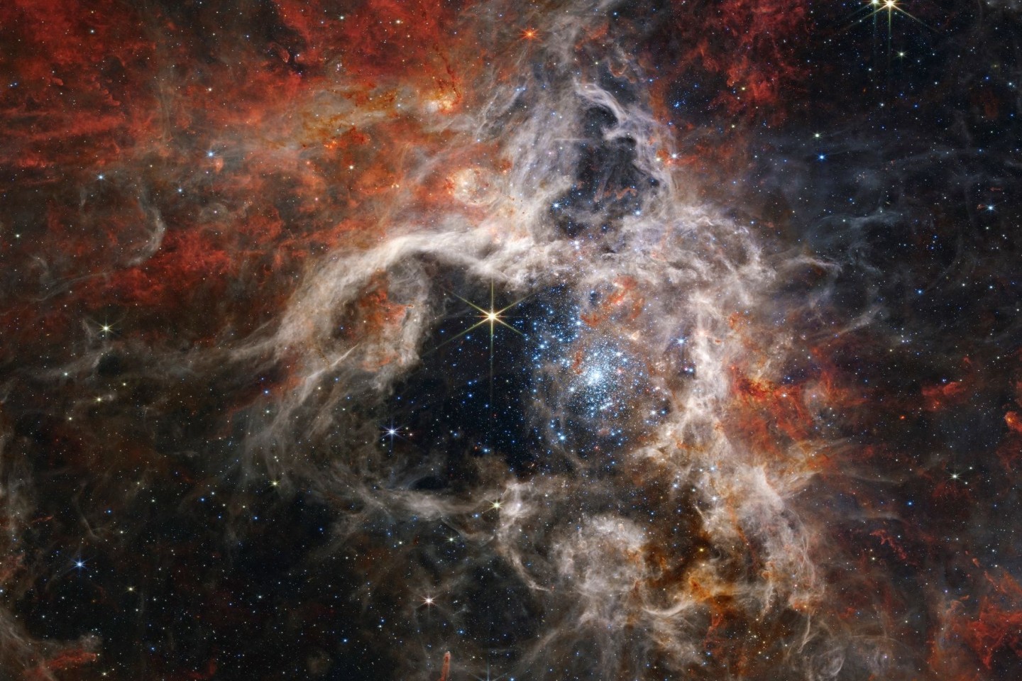 Dieses von der NASA veröffentlichte Bild zeigt die Sternentstehungsregion des Tarantula-Nebels, aufgenommen vom James Webb Space Telescope.